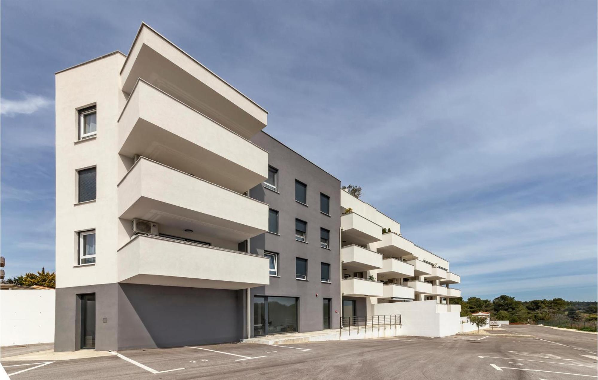 Amazing Apartment In Premantura With Kitchen Exterior photo